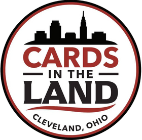 Logo for 'Cards in the Land' with a city skyline silhouette on a white background