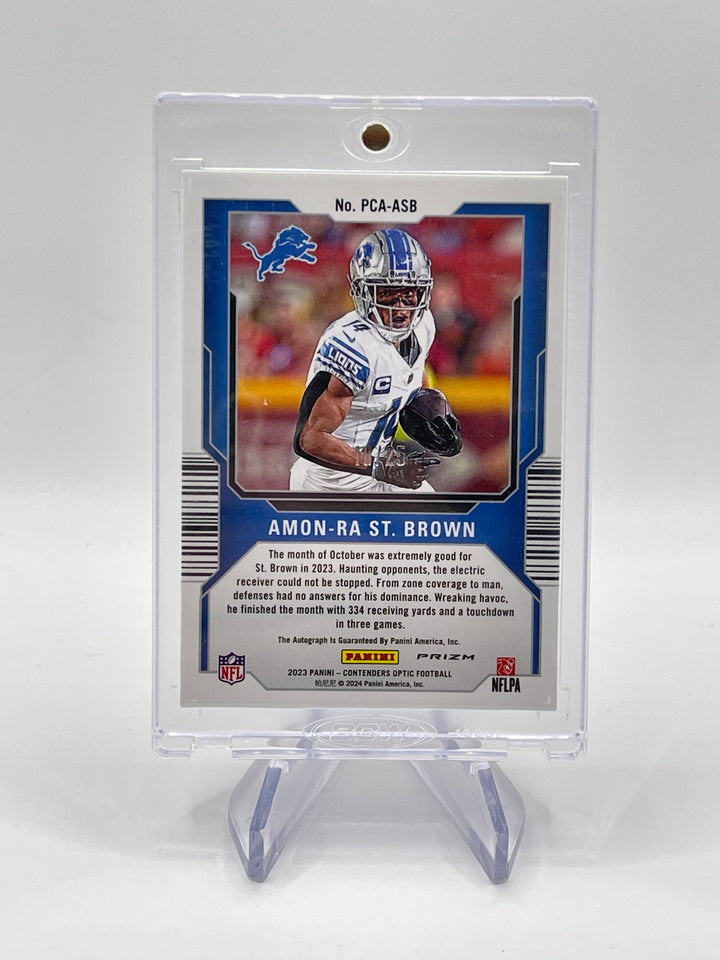 2023 Contenders Optic Amon-Ra St. Brown Perennial Contenders Black Choice Auto /25